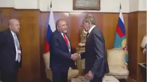  ??  ?? DEFENSE MINISTER Avigdor Lieberman is welcomed to Moscow yesterday by Russian Foreign Minister Sergei Lavrov.
