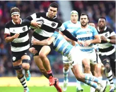  ??  ?? Barbarians Jack Debreczeni in action with Argentina’s Juan Cruz Mallia. — Reuters photo