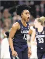  ?? Mike Ehrmann / Getty Images ?? UConn’s Christyn Williams celebrates a basket against Notre Dame on Friday.