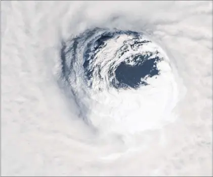  ?? NASA/VIA AP ?? This photo made available by NASA shows they eye of hurricane Michael, as seen from the Internatio­nal Space Station on Wednesday, Oct. 10.
