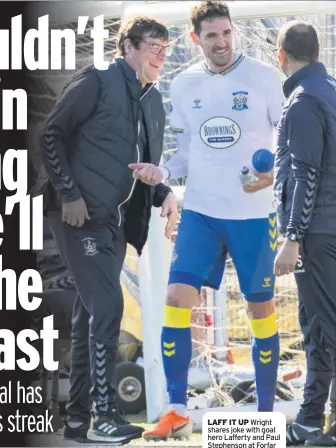  ??  ?? LAFF IT UP Wright shares joke with goal hero Lafferty and Paul Stephenson at Forfar