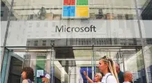  ?? Reuters ?? A Microsoft store in New York. The firm is battling foreign nation-state hackers and occasional­ly the US government.