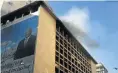  ??  ?? The Johannesbu­rg building housing Gauteng premier David Makhura’s office caught fire last year.