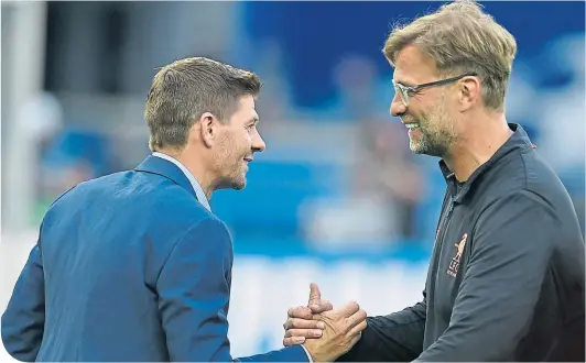  ??  ?? Steven Gerrard and Jurgen Klopp share mutual respect – and now the same length of contract