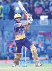  ??  ?? KKR batsman Manish Pandey playing a shot.