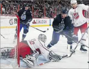  ?? Christian Petersen, Getty images ?? Florida Panthers’ Brian Campbell of team Chara attempts to score against Los Angeles Kings goalie Jonathan Quick of team Alfredsson during
the NHL all-star game at Scotiabank Place on Sunday in Ottawa.