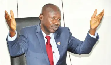  ??  ?? Acting Chairman of the Economic and Financial Crimes Commission (EFCC) Ibrahim Magu during a courtesy visit to Media Trust headquarte­rs in Abuja yesterday.