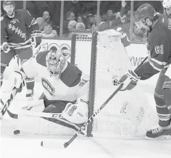  ??  ?? Montreal Canadiens goalie Carey Price tends the net against New York Rangers left wing Rick Nash.