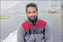  ??  ?? Umar Zahoor, a shikara owner at Dal Lake, Srinagar