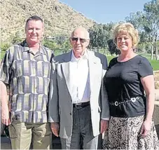  ??  ?? Ambassador Tapia with his children, Tim (left) and Londa Perkins.