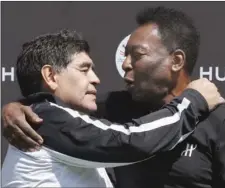  ?? (AFP) ?? Diego Maradona with Pele after a football match at the Jardin du Palais Royal in Paris, on the eve of the Euro 2016, on June 9, 2016.