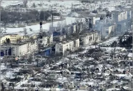  ?? THE ASSOCIATED PRESS ?? New video footage of Bakhmut shot from the air with a drone for The Associated Press shows how the longest battle of the year-long Russian invasion has turned the city of salt and gypsum mines in eastern Ukraine into a ghost town.