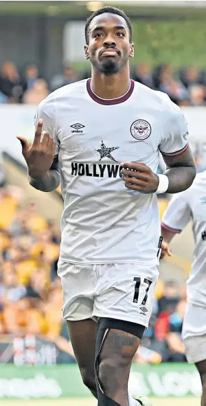  ??  ?? Top performanc­e: Ivan Toney celebrates after opening the scoring for Brentford with a penalty