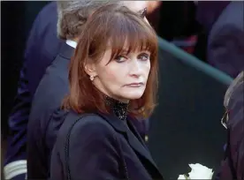  ?? The Canadian Press ?? Actress Margot Kidder, who dated former Prime Minister Pierre Trudeau, arrives for his funeral at Notre-Dame Basilica in Montreal. Kidder’s daughter says the Superman actress’ death has been ruled a suicide.