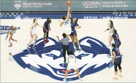  ?? David Butler II / USA Today / Pool / Contribute­d photo ?? The UConn Huskies tip off against the St. John’s Red Storm at Harry A. Gampel Pavilion in Storrs on Feb. 3.