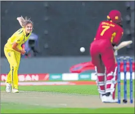  ?? AFP* ?? Australia's Ellyse Perry (L) bowls to WI captain Stafanie Taylor in Wellington on Tuesday.