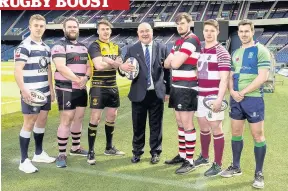  ??  ?? Successful six Players including Stirling County’s Ross Bundy (third from right) representi­ng the Super 6 teams with SRU chief executive Mark Dodson