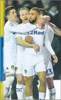  ??  ?? JOY: Kemar Roofe is congratula­ted on scoring the opener