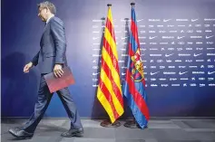  ?? — AFP photo ?? FC Barcelona’s president Josep Maria Bartomeu leaves after giving a press conference at the Camp Nou stadium in Barcelona on October 2, 2017.