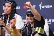  ?? Sarah Stier/getty Images ?? Becky Hammon, right, a former Spurs assistant coach, led the Las Vegas Aces to the WNBA title.