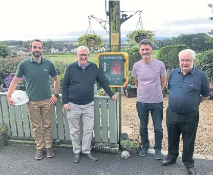  ??  ?? From left: Alan Jack of SP Energy Networks, MP Douglas Chapman, and Long Row residents Jim Spalding and Dave McLean.