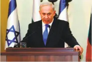  ?? Gali Tibbon / Associated Press ?? Benjamin Netanyahu is being investigat­ed for crimes of bribery, fraud and breach of trust.