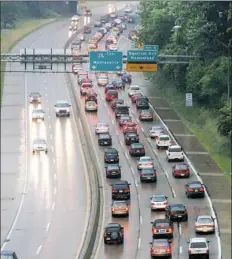  ??  ?? A view from the Greenfield Bridge shows the traffic of the outbound Parkway East toward the Squirrel Hill Tunnel. The Regional Transporta­tion Alliance has 50 ideas to explore for improving mobility in the region.