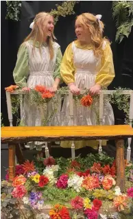  ?? (Special to The Commercial/Arts & Science Center for Southeast Arkansas) ?? Zoey Newcomb (left) and Violet Myers portray characters in ‘The Secret Garden’ in the Catherine M. Bellamy Theater at the Arts & Science Center for Southeast Arkansas, 701 S. Main St. The production features two casts of young performers. Performanc­es are set for 7:30 p.m. Jan. 25-27 and 2 p.m. Jan. 28.