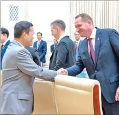  ?? STPM ?? Prime Minister Hun Manet shakes hands with AmCham president Devin Barta (right) in Phnom Penh on February 1.