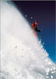  ?? PHOTO BY KEN GALLARD ?? An archival image of Ben Myers shredding the slopes.