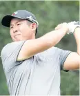  ?? AP ?? An Byeong-Hun watches his tee shot on the fourth hole.