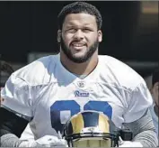  ?? Ryan Kang Associated Press ?? AARON DONALD says he will not wear a new face shield because “I need air when I’m out there.”