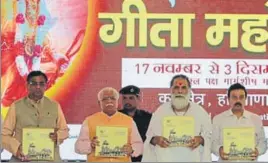  ?? HT PHOTO ?? Haryana CM Manohar Lal Khattar releasing a coffee table book on Gita Mahotsav in Delhi.