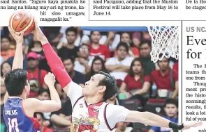  ??  ?? San Miguel Beer’s June Mar Fajardo, right, blocks a shot by Magnolia’s Ian Sangalang during Game 2 of the PBA Philippine Cup Finals Sunday at the SM Mall of Asia Arena. SMB won 90-74 to level at 1-1 the bestof-7 series with Game 3 on April 1, Easter...