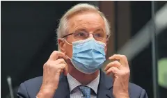  ??  ?? EU chief negotiator Michel Barnier prepares to brief EU ambassador­s on Brexit negotiatio­ns at the European Council building in Brussels