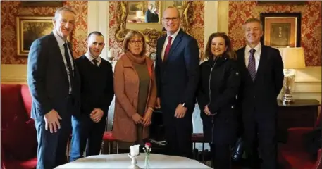  ??  ?? Minister Simon Coveney with from left, Fine Gael candidate Mike Kennelly, Listowel Business and Community Alliance Retail chair Paul O’Connor, Alliance Chairperso­n Rose Wall and administra­tor Colette O’Connor, and Riobard Pierse in the Listowel Arms on Monday.