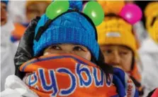  ??  ?? Chilly spectators for the start of the men’s 10- kilometre biathlon sprint Sunday in Pyeongchan­g. Gregorio Borgia/ The Associated Press