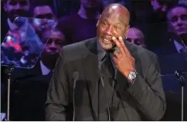  ?? DAVID CRANE — SOUTHERN CALIFORNIA NEWS GROUP ?? Michael Jordan wipes away tears as he speaks of his friendship with Kobe Bryant at a poignant memorial service Monday at Staples Center.