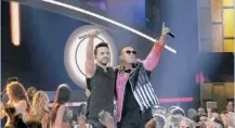  ?? /ARCHIVO ?? Los artistas Luis Fonsi y Daddy Yankee disfrutan de la gloria con ‘Despacito’.