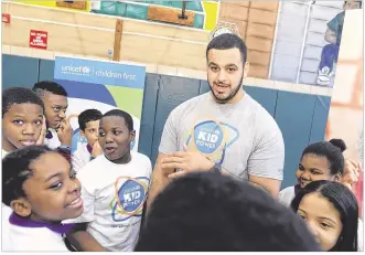  ?? STEPHEN LOVEKIN / GETTY IMAGES ?? Belying his on-field demeanor, Texans guard and devout Muslim Oday Aboushi is deeply involved in children’s causes. “I like to help people. That’s really important to me,” Aboushi said.