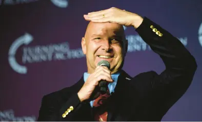  ?? JEFF SWENSEN/GETTY ?? Pennsylvan­ia Republican gubernator­ial candidate Doug Mastriano looks toward supporters at a rally Aug. 19 in Pittsburgh.