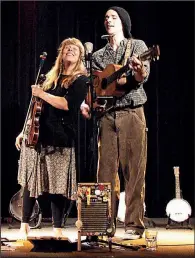  ??  ?? Still on the Hill — Donna Stjerna Mulhollan and Kelly Mulhollan — performs Saturday at Little Rock’s Hibernia Irish Tavern under the auspices of the Little Rock Folk Club.