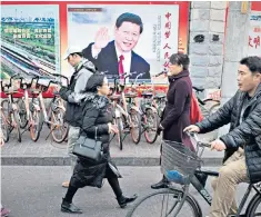  ??  ?? President Xi Jinping is all-powerful in China – but dare he detonate a Wall Street crash?