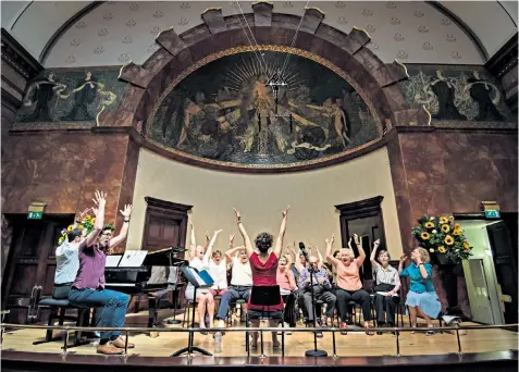  ??  ?? Raise the roof: the Singing With Friends choir, led by Issy Adams, takes part in a session where everyone can get involved, no matter what their abilities or experience