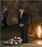  ?? DAN BALILTY — THE ASSOCIATED PRESS ?? In this file photo, New York Gov. Andrew M. Cuomo lays a wreath at the Hall of Remembranc­e at the Yad Vashem Holocaust memorial in Jerusalem.