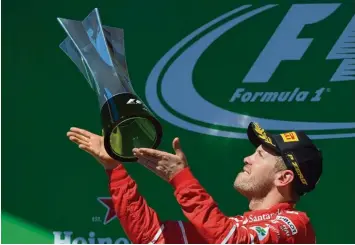  ?? Foto: Carl de Souza, afp ?? Nach einigen Rennen voller Pleiten, Pech und Pannen hat es Sebastian Vettel zurück in die Erfolgsspu­r geschafft. Er gewann am Sonntag den Großen Preis von Brasilien.