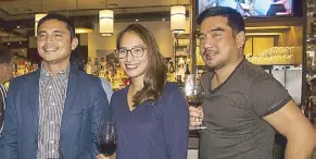  ??  ?? Business partner Marvin Agustin, managing partner Leina Bolinas and group head Raymund Magdaluyo brought in Wolfgang Steakhouse.