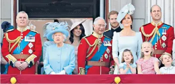  ??  ?? Part of the family: the Duchess at the Trooping the Colour, and below, with her new in-laws at Prince Charles’s garden party