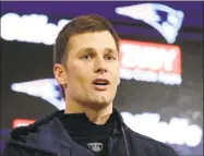  ?? Elise Amendola / Associated Press ?? Patriots quarterbac­k Tom Brady, age 41, says he intends to play football in 2019.