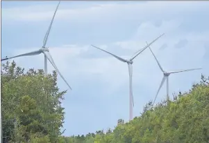  ?? DAVID JALA/CAPE BRETON POST ?? Wind farms, such as Cape Breton University’s three power-generating turbines in Gardiner Mines, have become a familiar part of the local landscape over the past few years. The CBU project became operationa­l earlier this year and because the power...